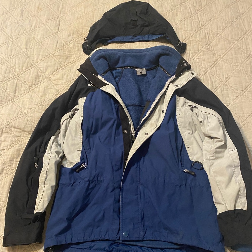 Columbia shell jacket with removable fleece liner and hood.